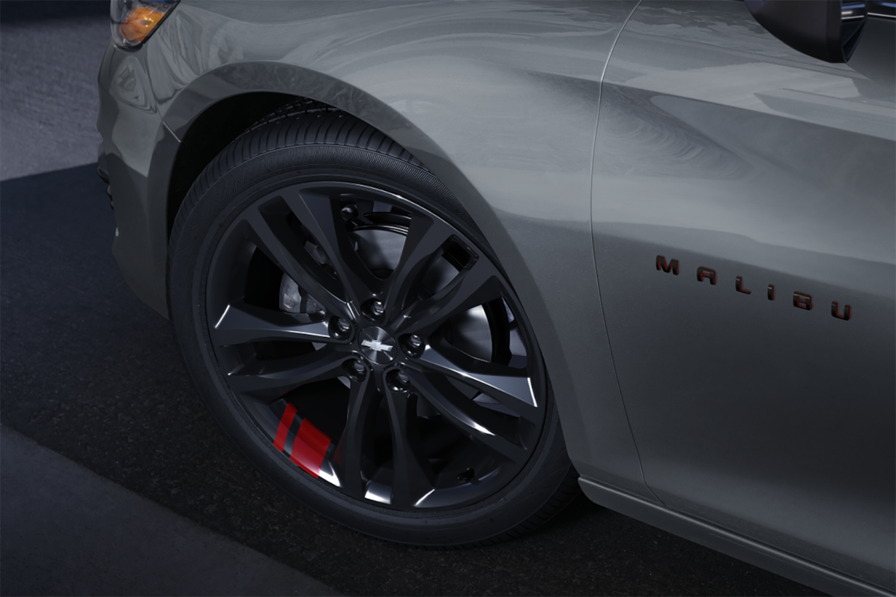 Close-up view of the 2024 Chevrolet Malibu exterior front left wheel and badging.