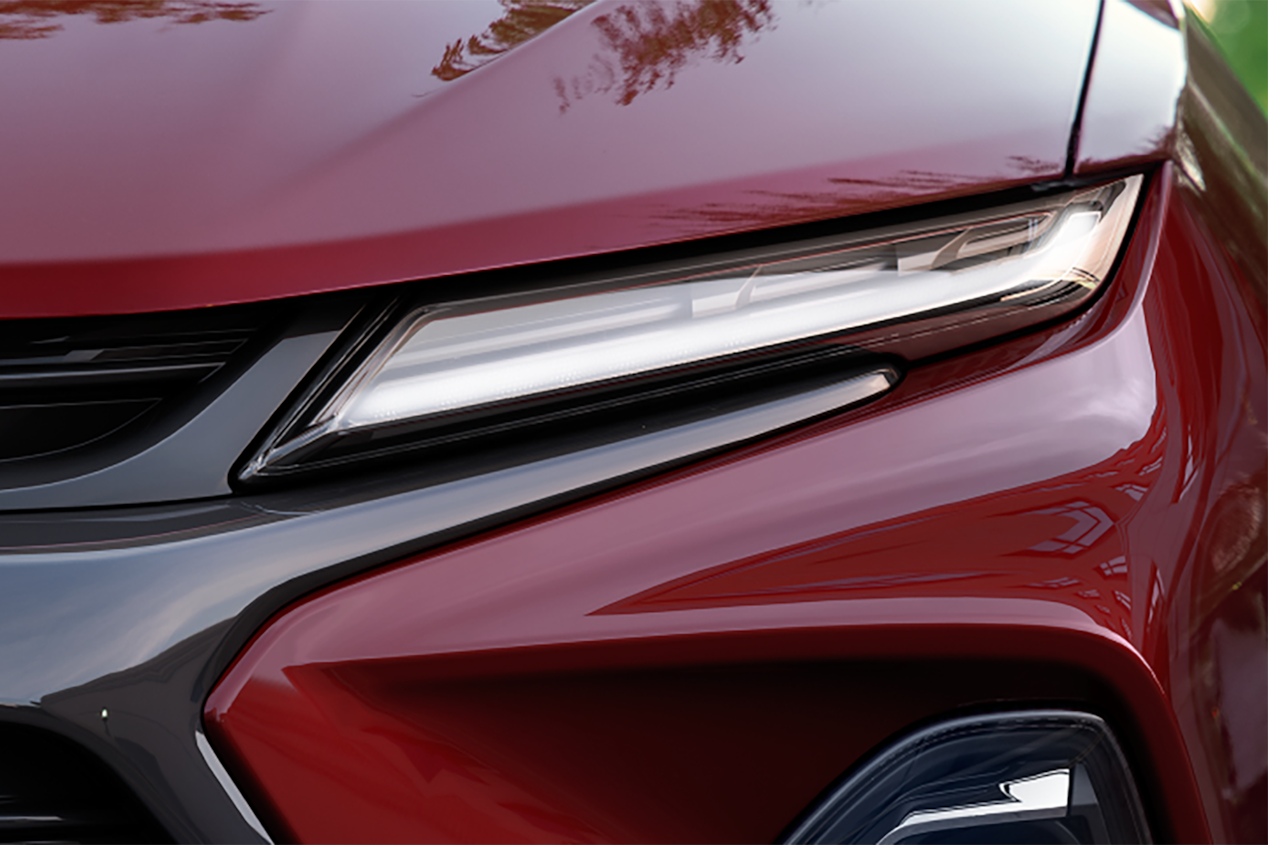 Closeup on the headlight of a 2024 Chevrolet Blazer sporty mid-size SUV.