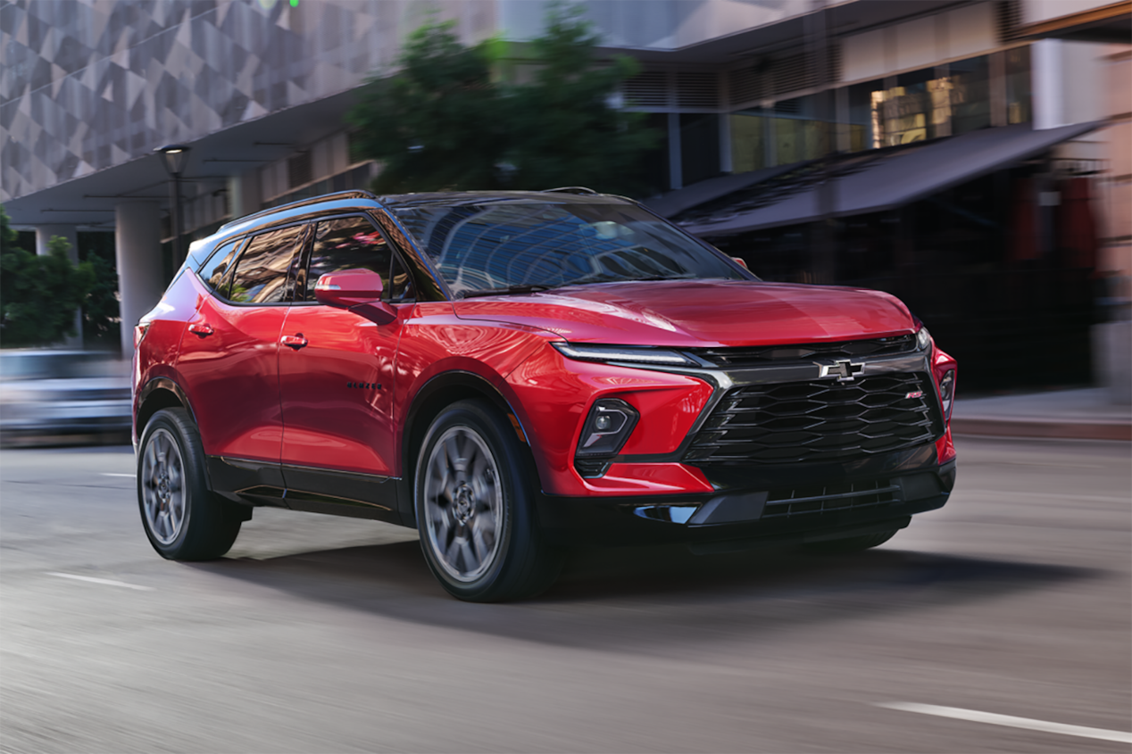 2024 Chevrolet Blazer sporty mid-size SUV driving through the city.