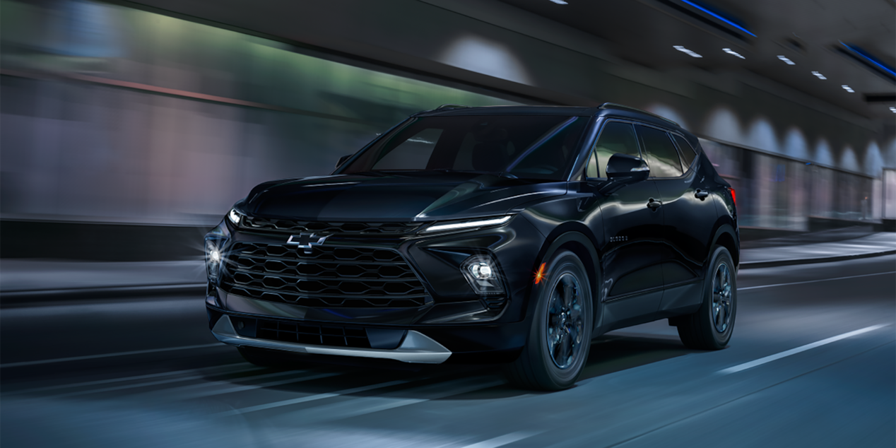 2024 Chevrolet Blazer Special Edition SUV driving through a tunnel at night.