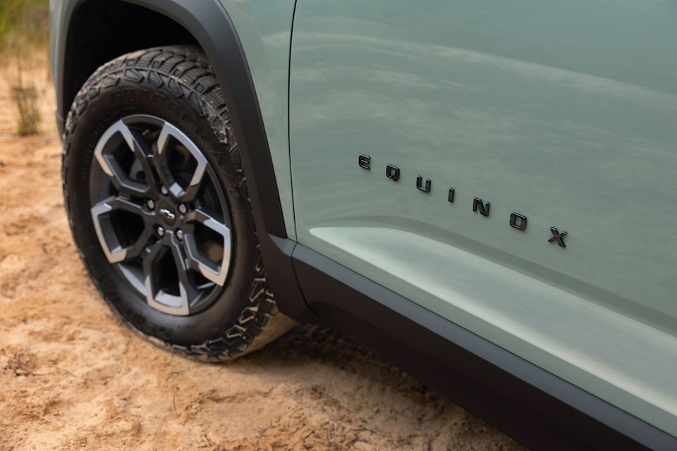 Close up of the Equinox badging on the 2025 Chevrolet Equinox compact SUV.