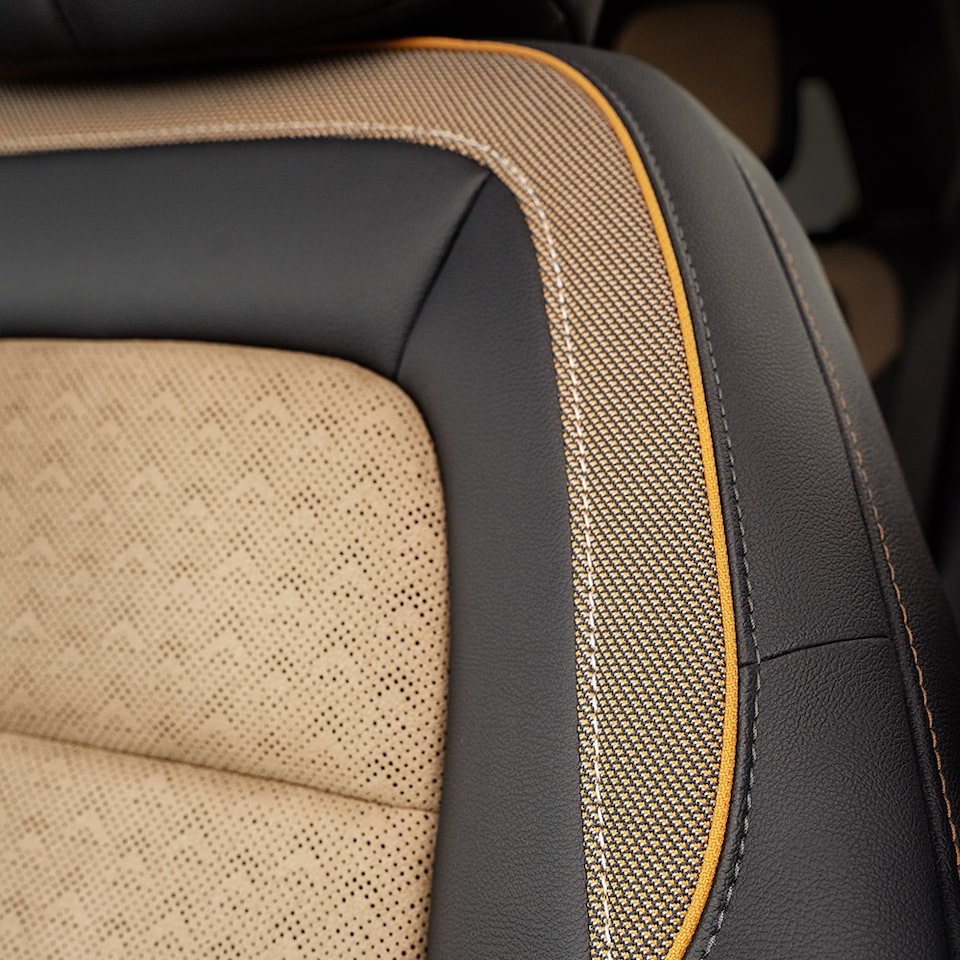 Close up view of the interior seat stitching details inside the 2025 Chevrolet Equinox compact SUV.