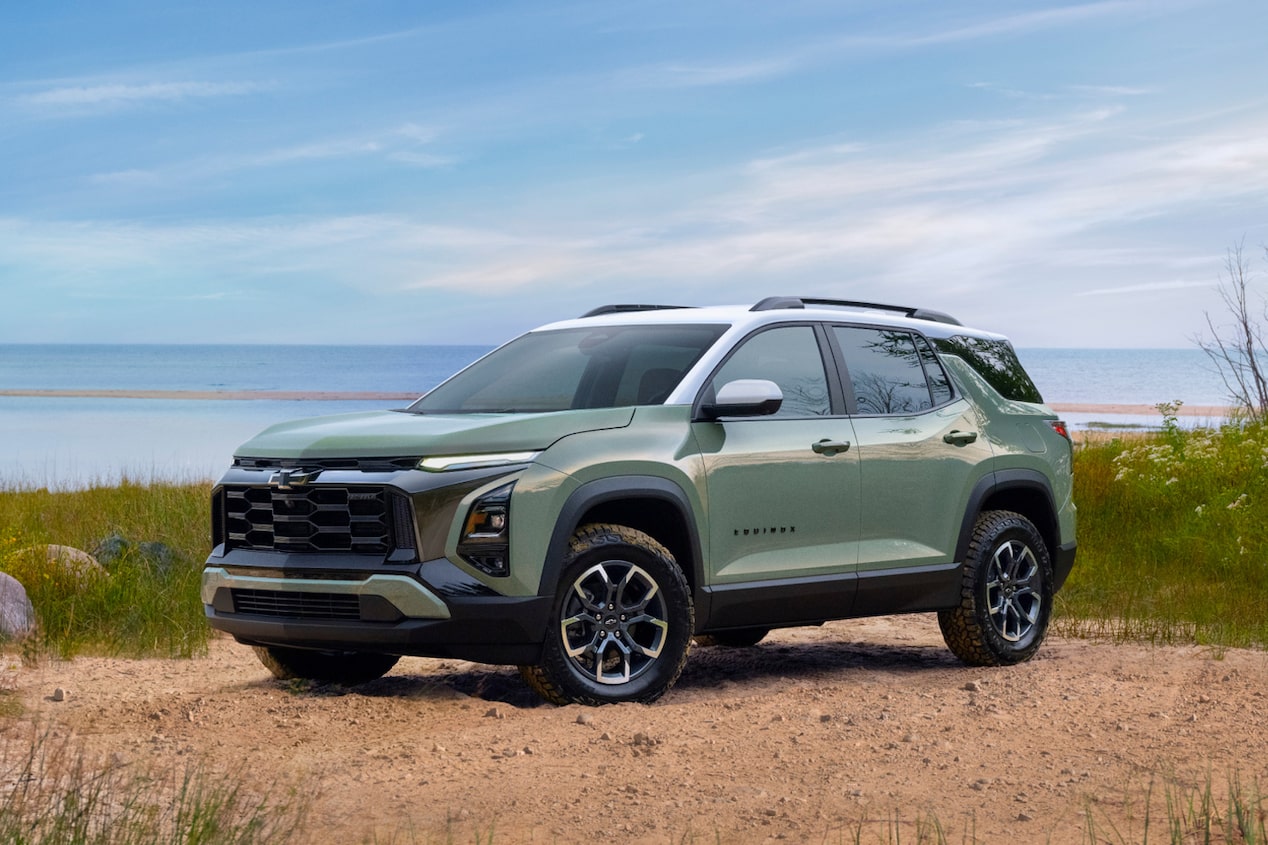 Front-side view of the 2025 Chevrolet Equinox compact SUV parked alone by the beach.