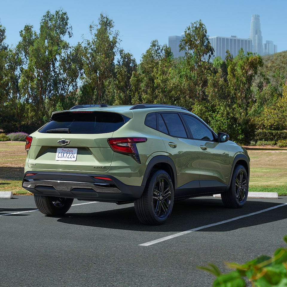 The 2025 Chevrolet Trax in a parking spot by the park.