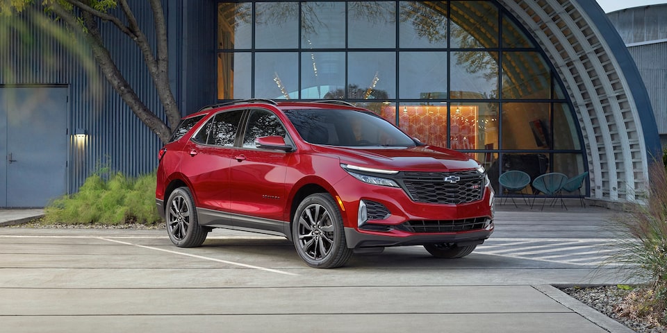 The stylish & versatile 2024 Chevrolet Equinox parked outside the office