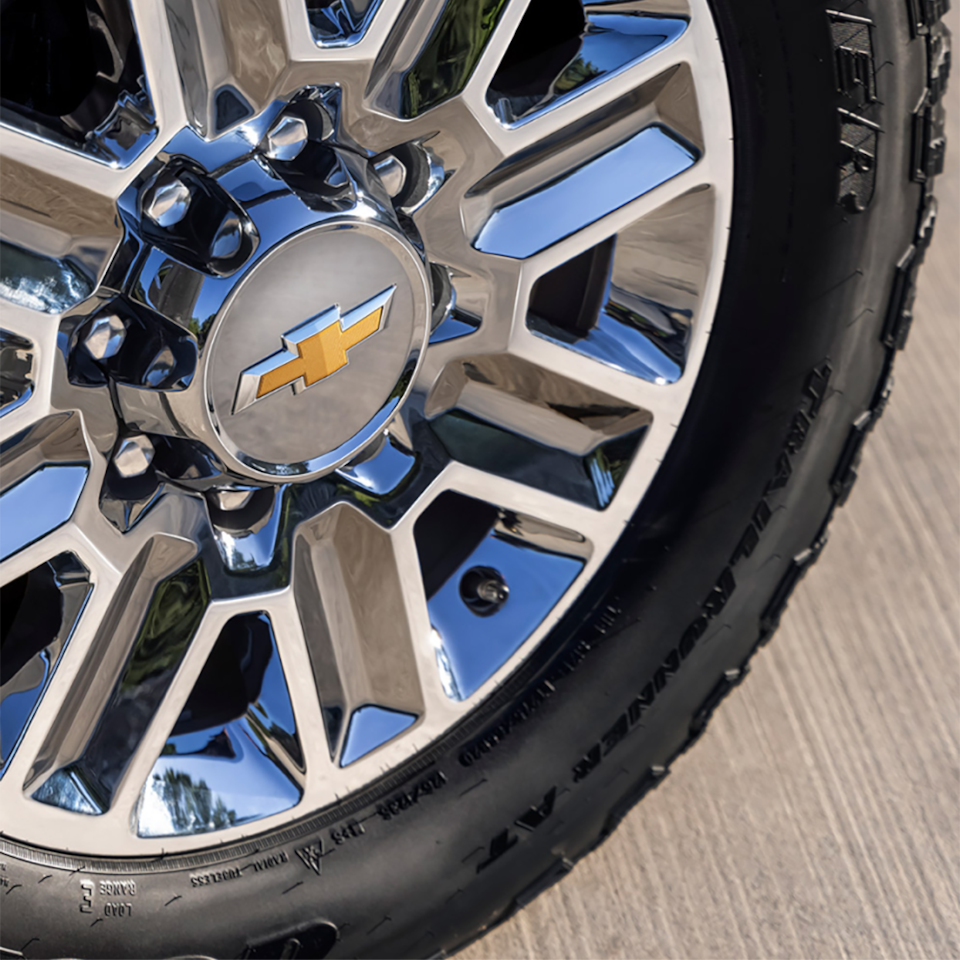 Close up view of the aluminum wheels on the 2025 Chevrolet Silverado HD pickup truck.