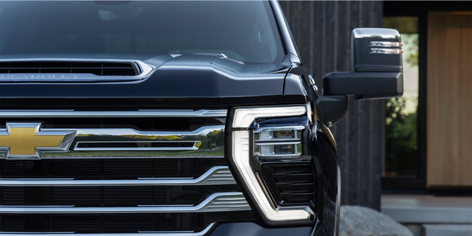 Close up view of the Intellibeam headlights on the 2025 Chevrolet Silverado HD.