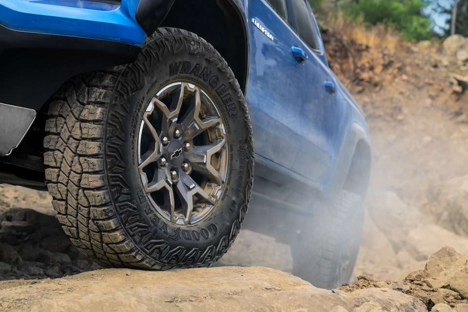 Wheel close-up of blue ZR2 Family truck.