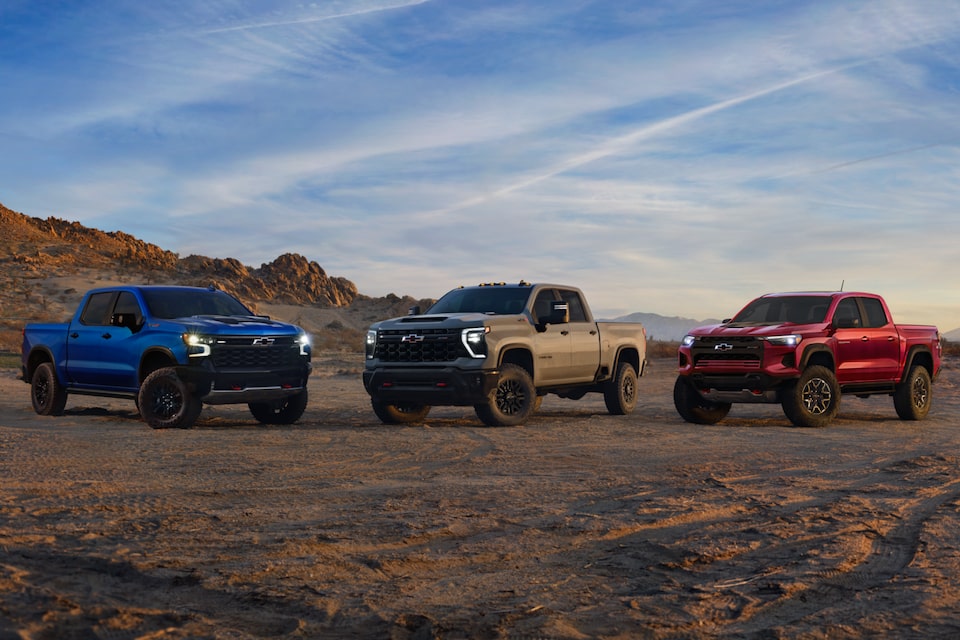 ZR2 Family line-up of the Silverado ZR2, Silverado HD ZR2, and Colorado ZR2 in the desert.