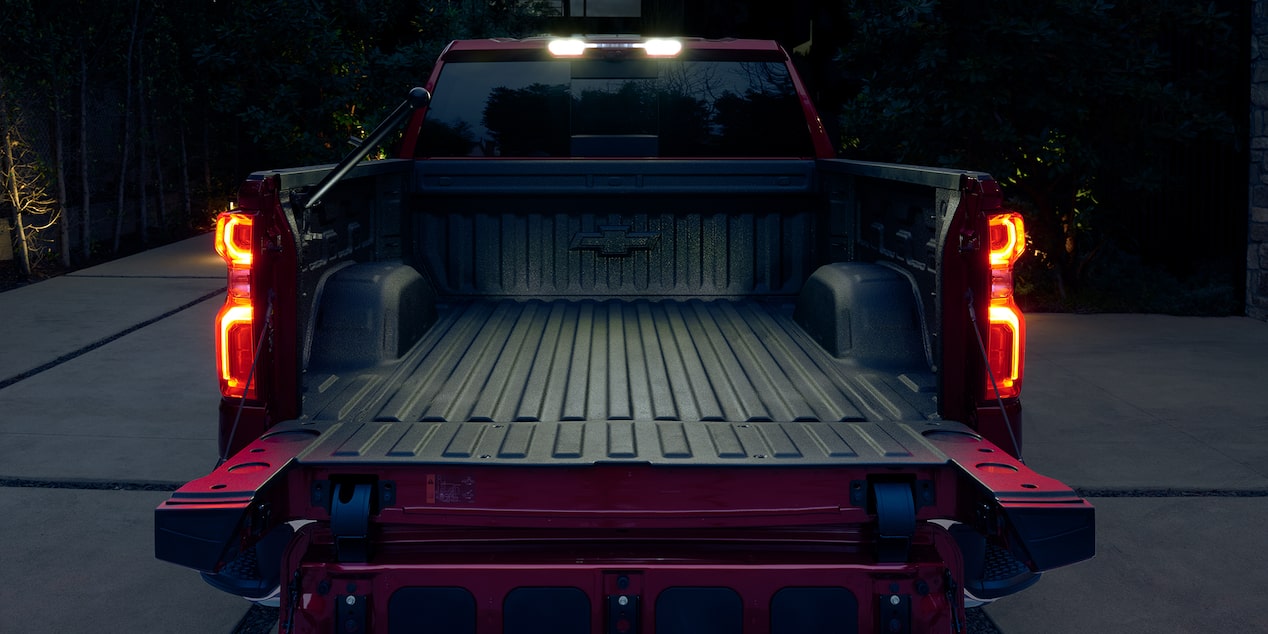 Back view of the lowered tailgate of the Chevrolet Silverado work truck.