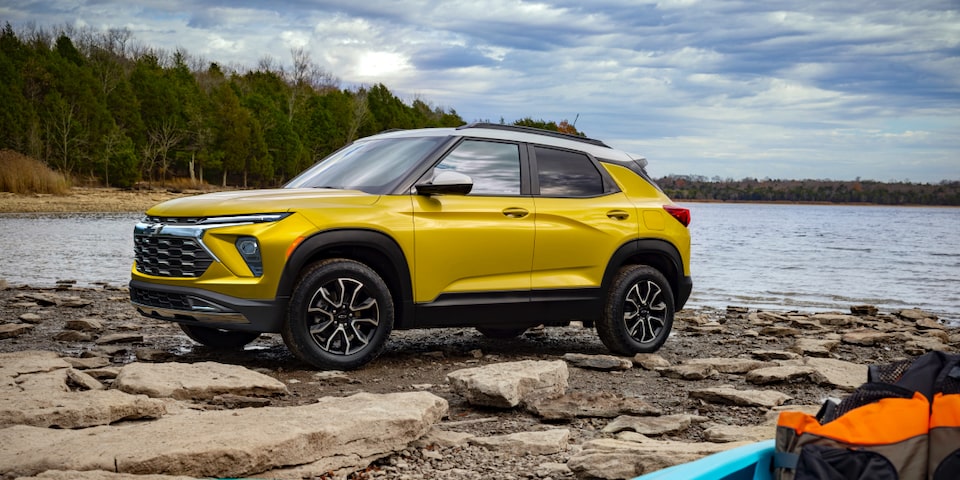 Side view of the 2024 Chevrolet Trailblazer parked by the lakeside.