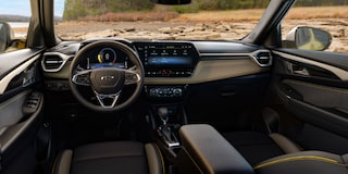 Rear passenger's view of the interiors of the 2024 Chevrolet Trailblazer.