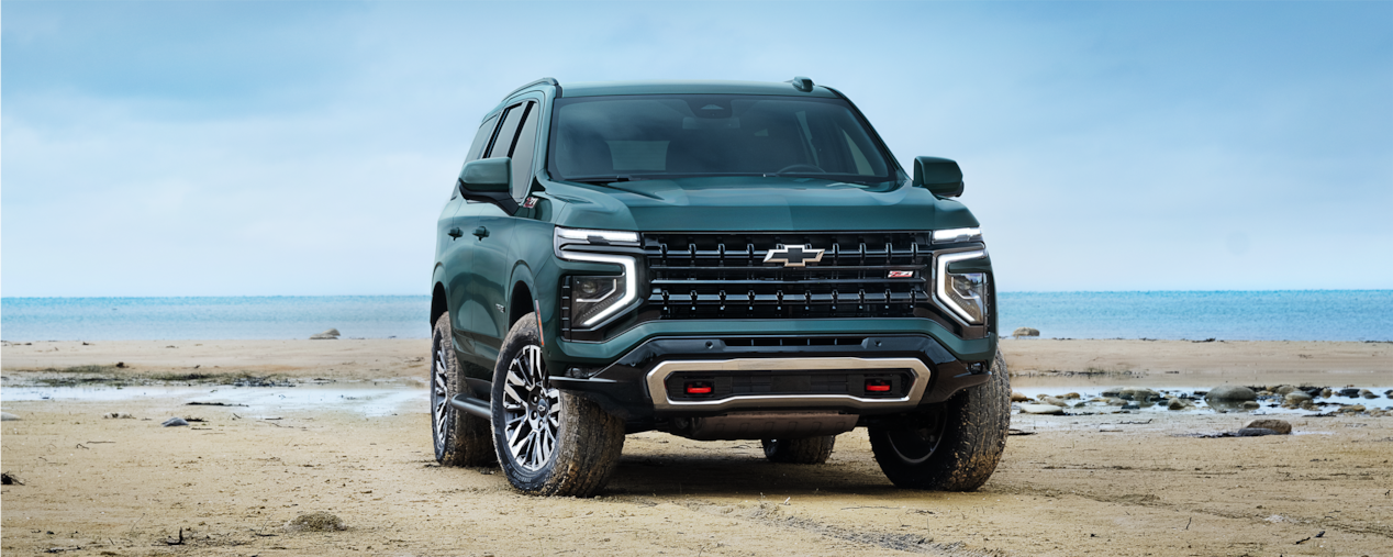 Front view of the 2025 Chevrolet Tahoe SUV Parked on the Sand.