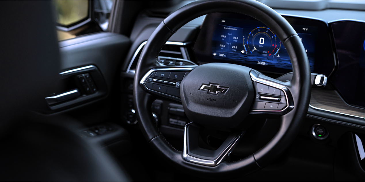 Close-up view of the steering wheel inside the 2025 Chevrolet Tahoe.