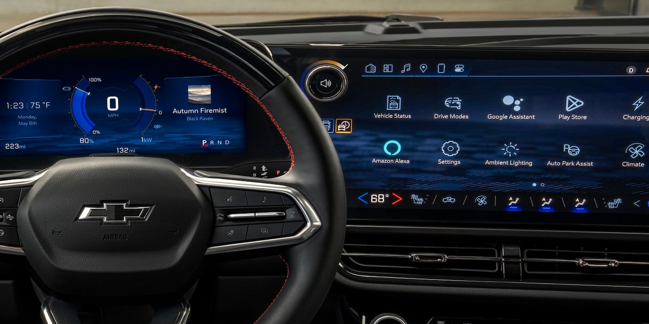 Driver’s view of a 2025 Chevrolet Equinox EV steering wheel and dashboard menu.