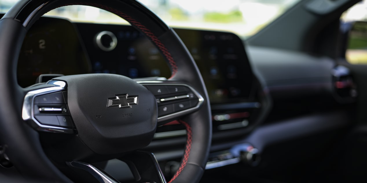 Close-up view of the steering wheel of a 2025 Silverado EV.