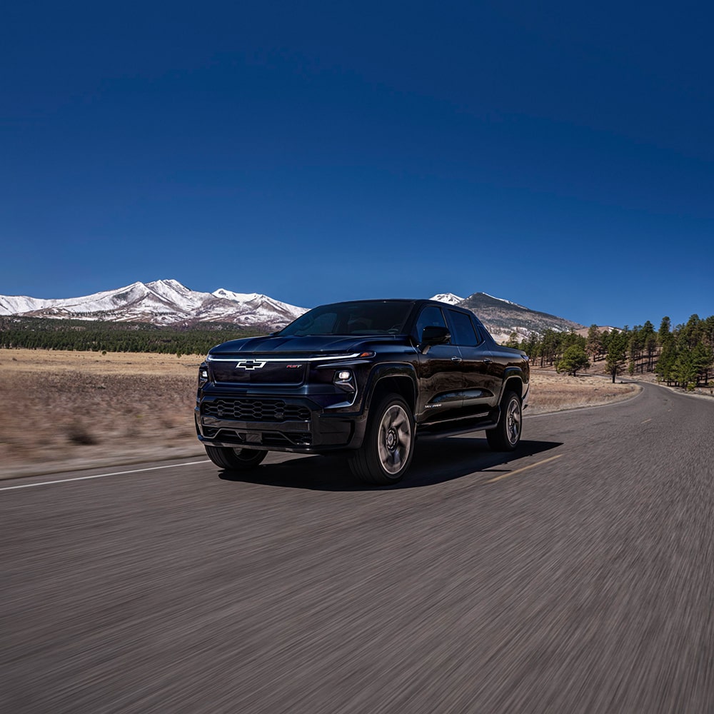 Chevrolet Silverado EV Driving on a Country Road