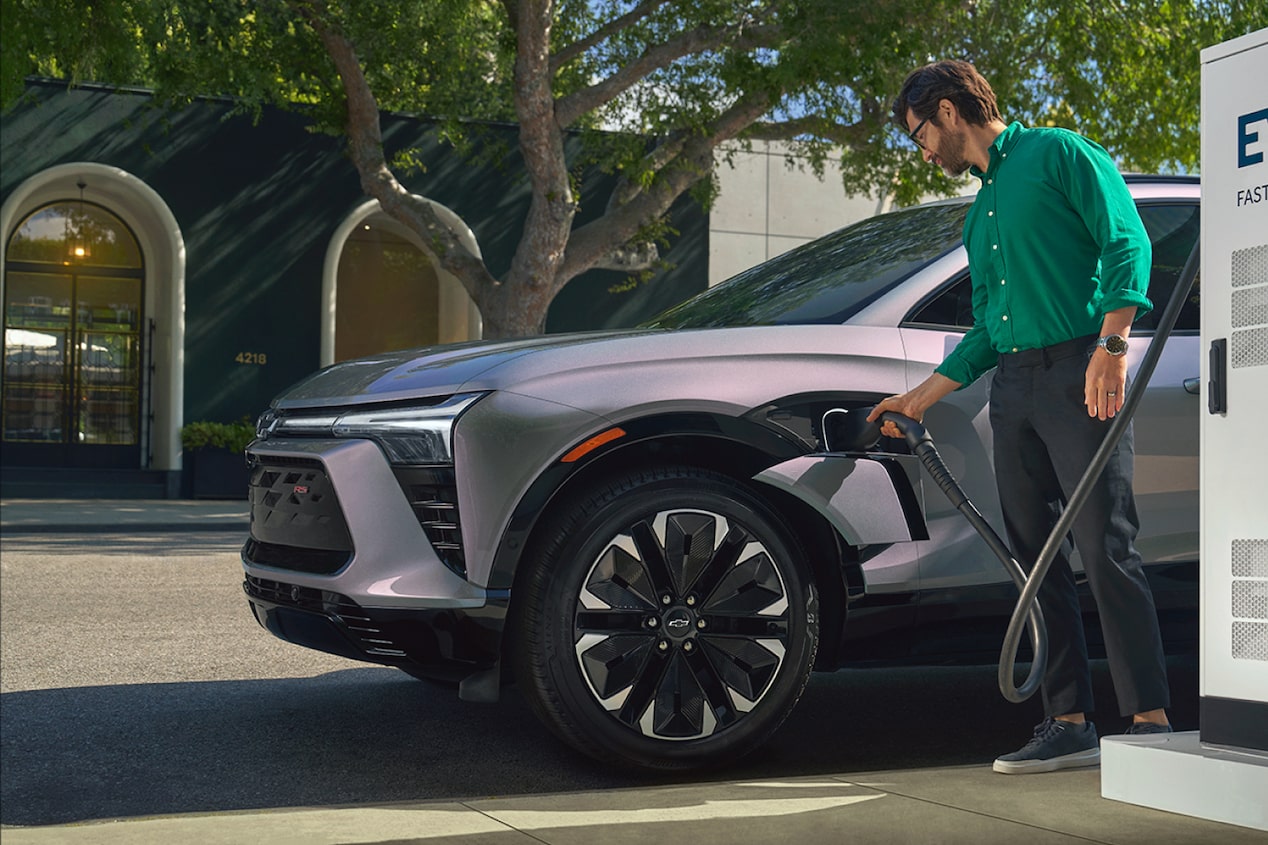 Man Charging his Chevrolet Blazer EV Outside