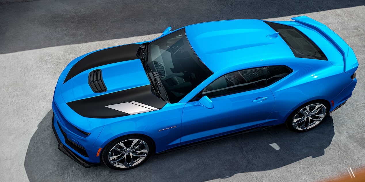 Overhead view of the Rapid Blue 2024 Chevrolet Camaro parked on side of the road.