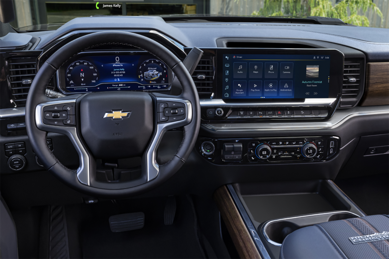 Driver's view of the steering wheel and 13.4 inch Diagonal Infotainment Touch-Screen on the 2025 Chevrolet Silverado HD pickup truck.