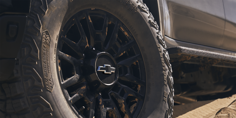 Close up view of the 35-inch Goodyear Wrangler Territory tires on the 2025 Chevrolet Silverado HD pickup truck.