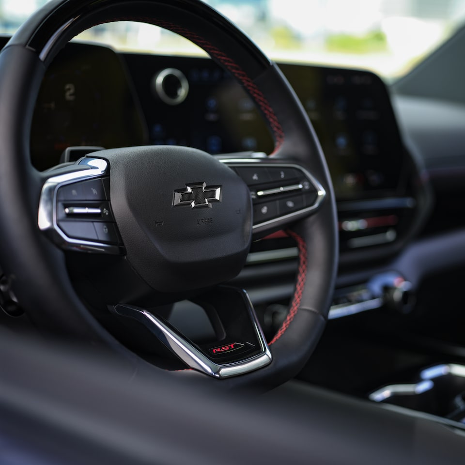 Close-Up view of the 2024 Chevrolet Silverado EV interior steering wheel.