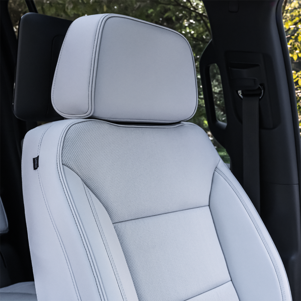 View of the Front Seats, Steering Wheel, and Infotainment System in the 2025 Chevrolet Suburban SUV