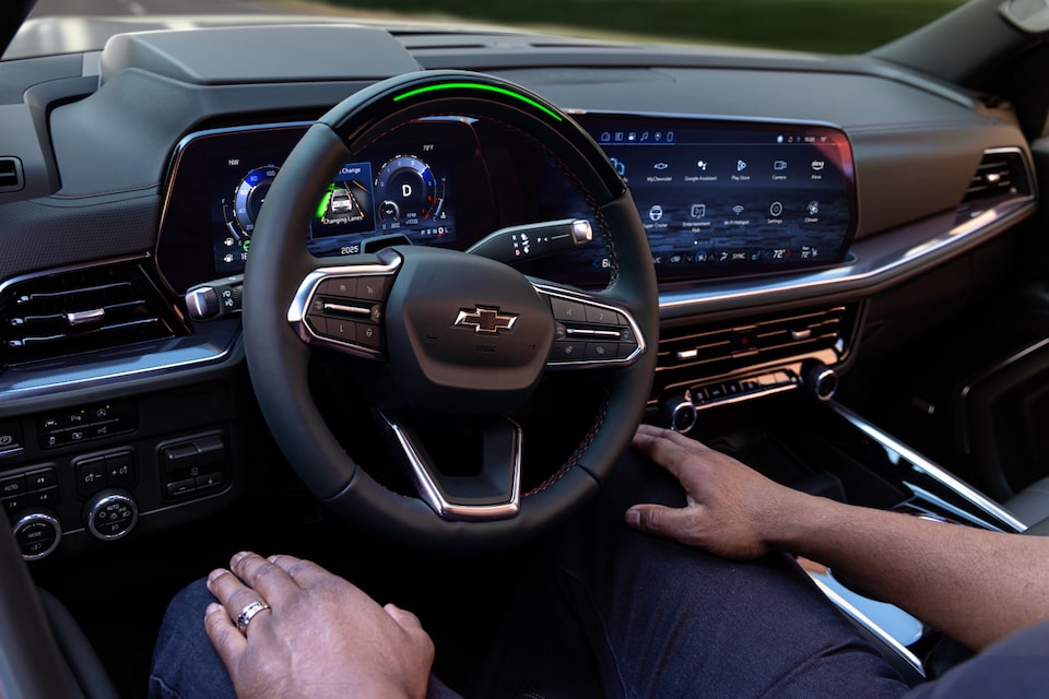 Driver in the 2025 Suburban utilizing the Available Super Cruise Driver Assistance Technology