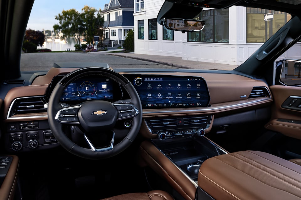 View of the Driver's Seat, Steering Wheel, and Infotainment System in the 2025 Chevrolet Suburban SUV