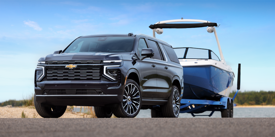 The New 2025 Chevrolet Suburban after towing a boat to the beach.