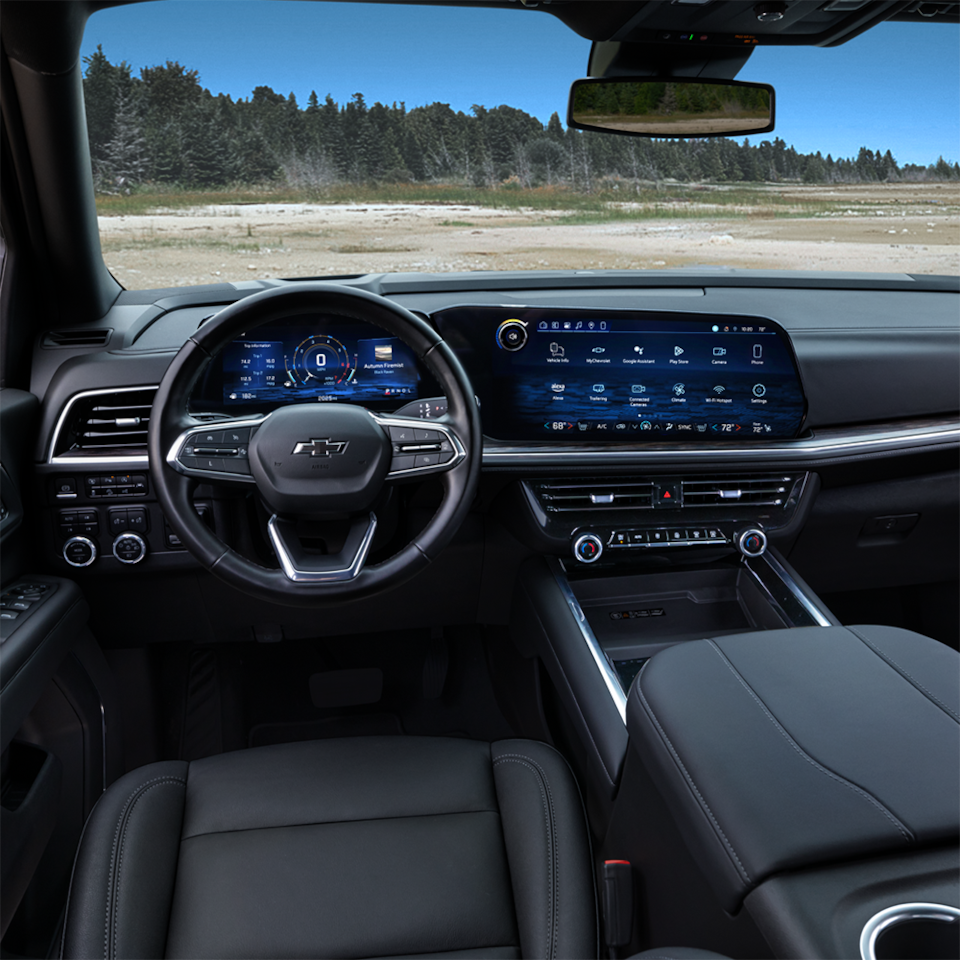 View of the Front Seats, Steering Wheel, and Infotainment System in the 2025 Chevrolet Suburban SUV