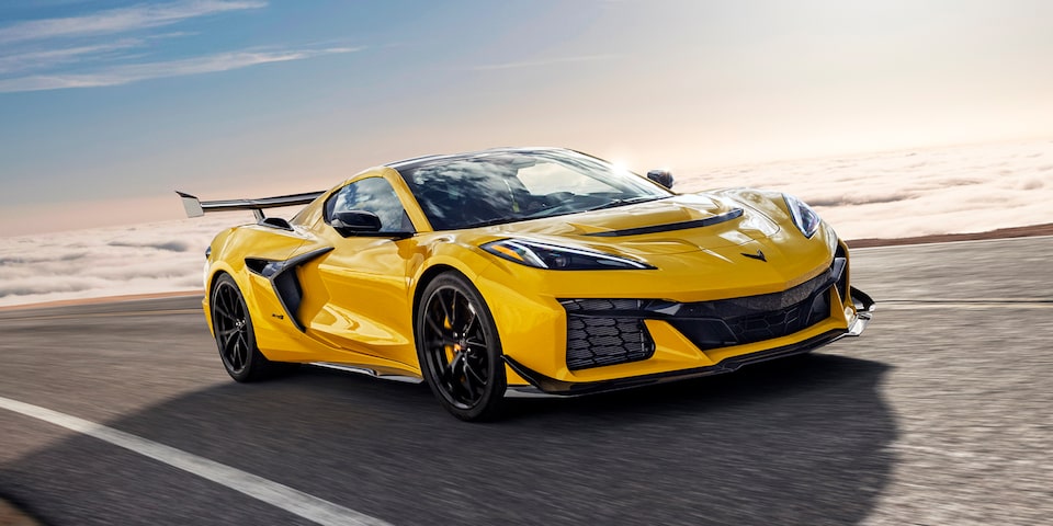 2025 Chevrolet Corvette ZR1 driving alone on the road during a sunny day.