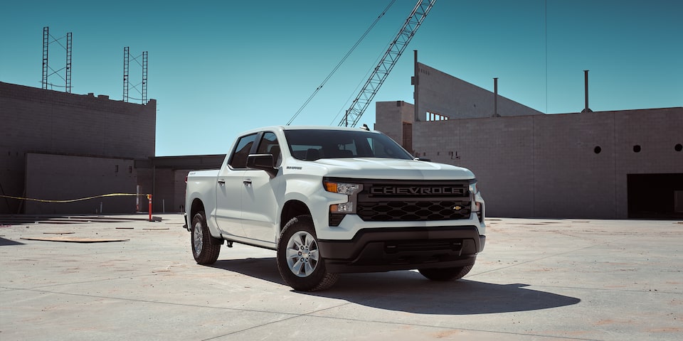 The 2024 Summit White Silverado HD Parked