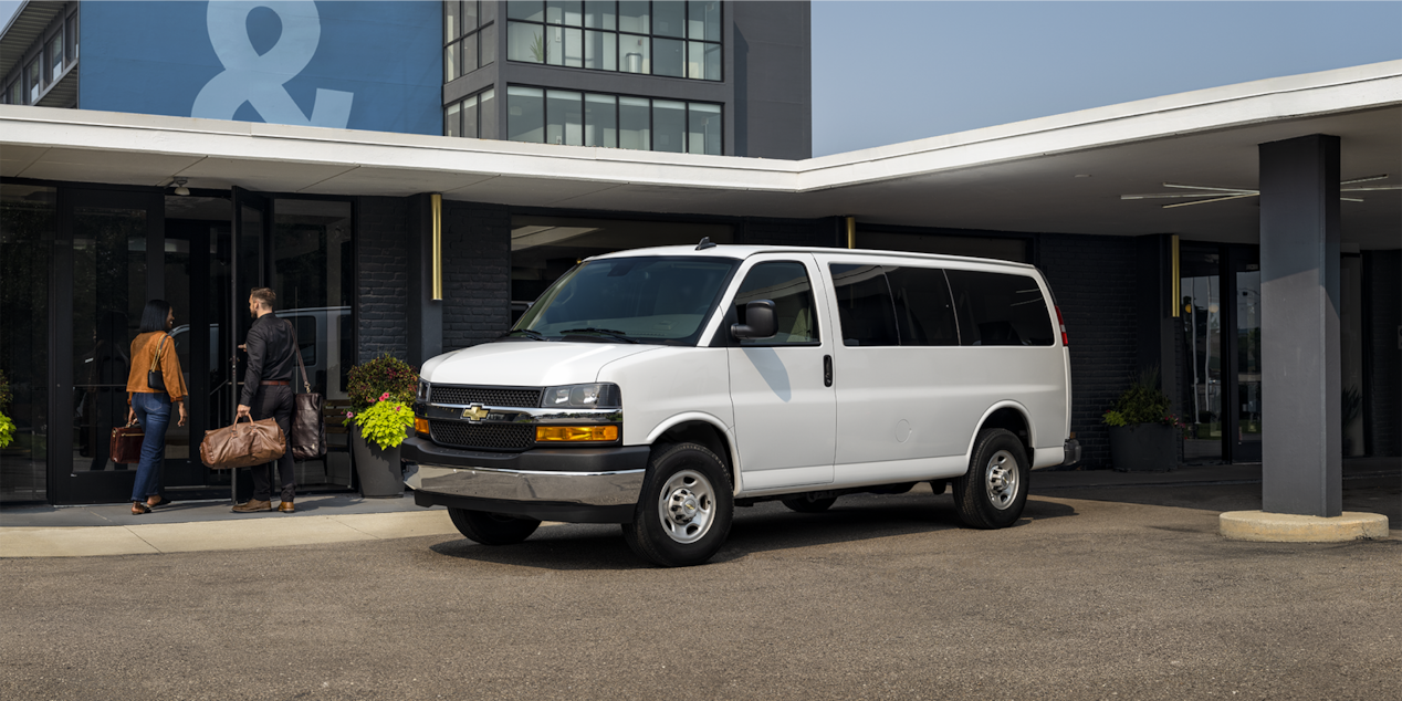 2025 Chevy Express Passenger Van Dropping Off a Family at a Hotel